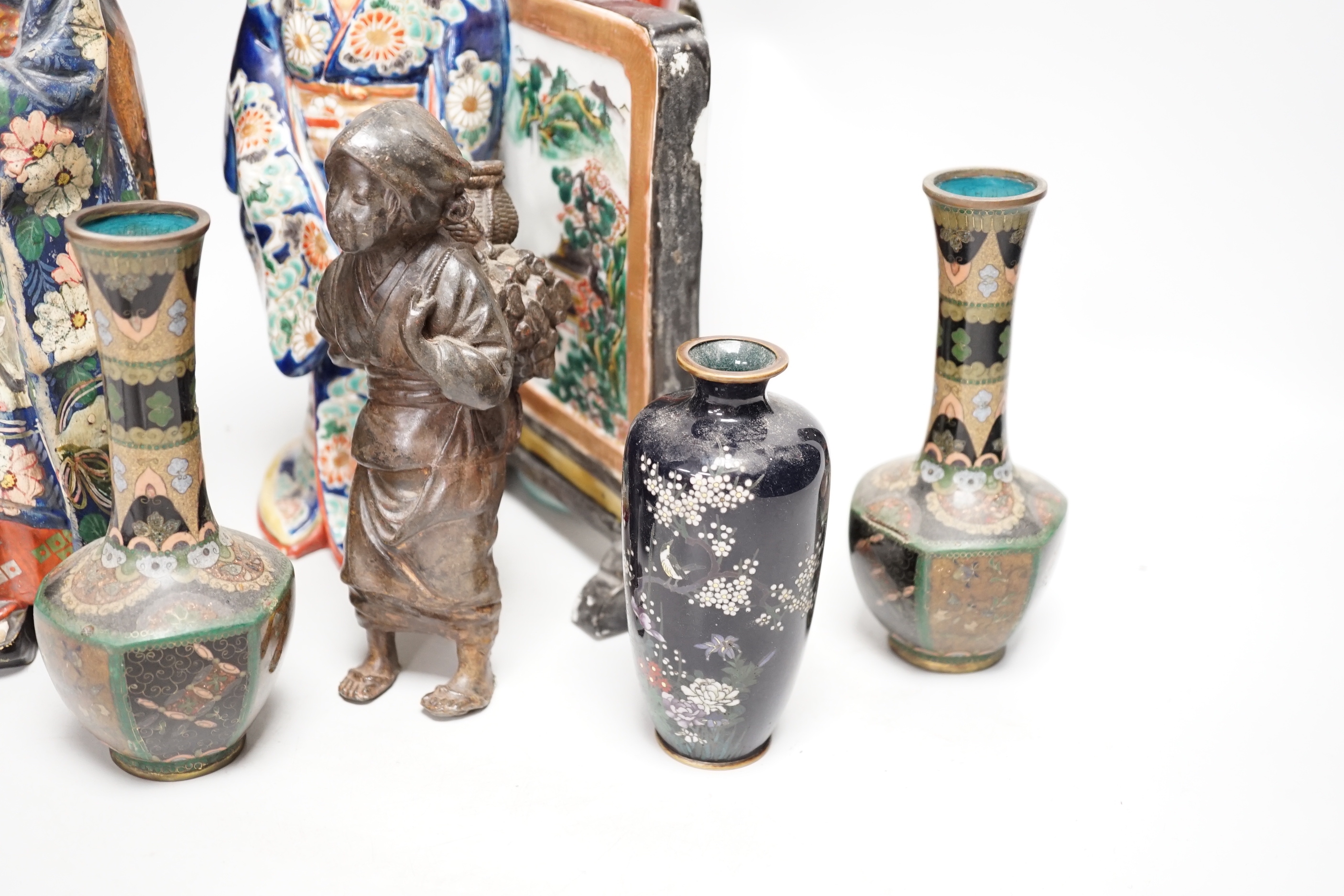 A collection of Japanese figures and three cloisonné enamel vases etc (7) including a Kutani group of two bijin by a table screen, tallest 28cm